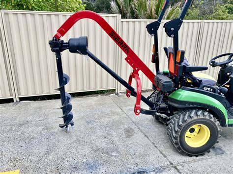 small tractor post hole digger